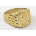 A yellow metal gents ring, stamped 18k, size U, approx 11.8g.