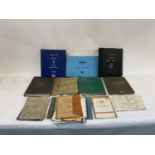 A collection of Jaguar books and brochures, including service manuals, spare parts catalogues, etc.