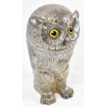 An exceptionally rare and very large hallmarked silver novelty wine cooler modelled as an owl, the
