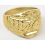 A yellow metal gents ring, stamped 18k, size U, approx 12.6g.