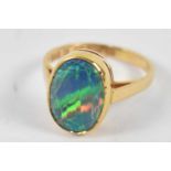 An 18ct yellow gold ring, set with fire opal (af), size L, approx. 3.6g.Condition Report: There