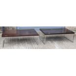 A pair of modern rectangular coffee tables with rosewood effect tops and square chrome bases, 127