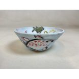 † SIMEON STAFFORD; a pottery bowl hand painted with fish to both interior and exterior, signed to