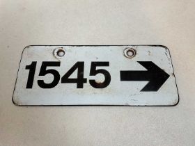 A vintage railway enamel sign '1545' with an arrow, 27 x 11.5cm.