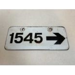 A vintage railway enamel sign '1545' with an arrow, 27 x 11.5cm.