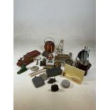 A collection of small wood and metalware to include brass easel, spirit flasks Guinness stand and