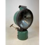 A rare and unusual large Tilley search light with green painted body, height 65cm.