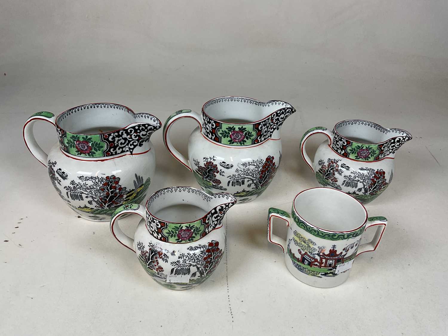 T.G. GREEN & CO LTD; four 'Ming' decorated jugs and a similarly decorated twin handled cup (5). - Image 2 of 14