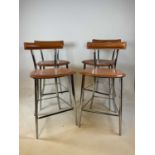 ARBEN; a set of four 1970s Italian tan leather and chrome stools.