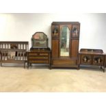 An early 20th century oak four piece bedroom suite, painted in the Chinoiserie style, comprising