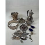 A group of silver plate including two chamber sticks, ice bucket, hot water pot, etc.