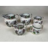 T.G. GREEN & CO LTD; four 'Ming' decorated jugs and a similarly decorated twin handled cup (5).