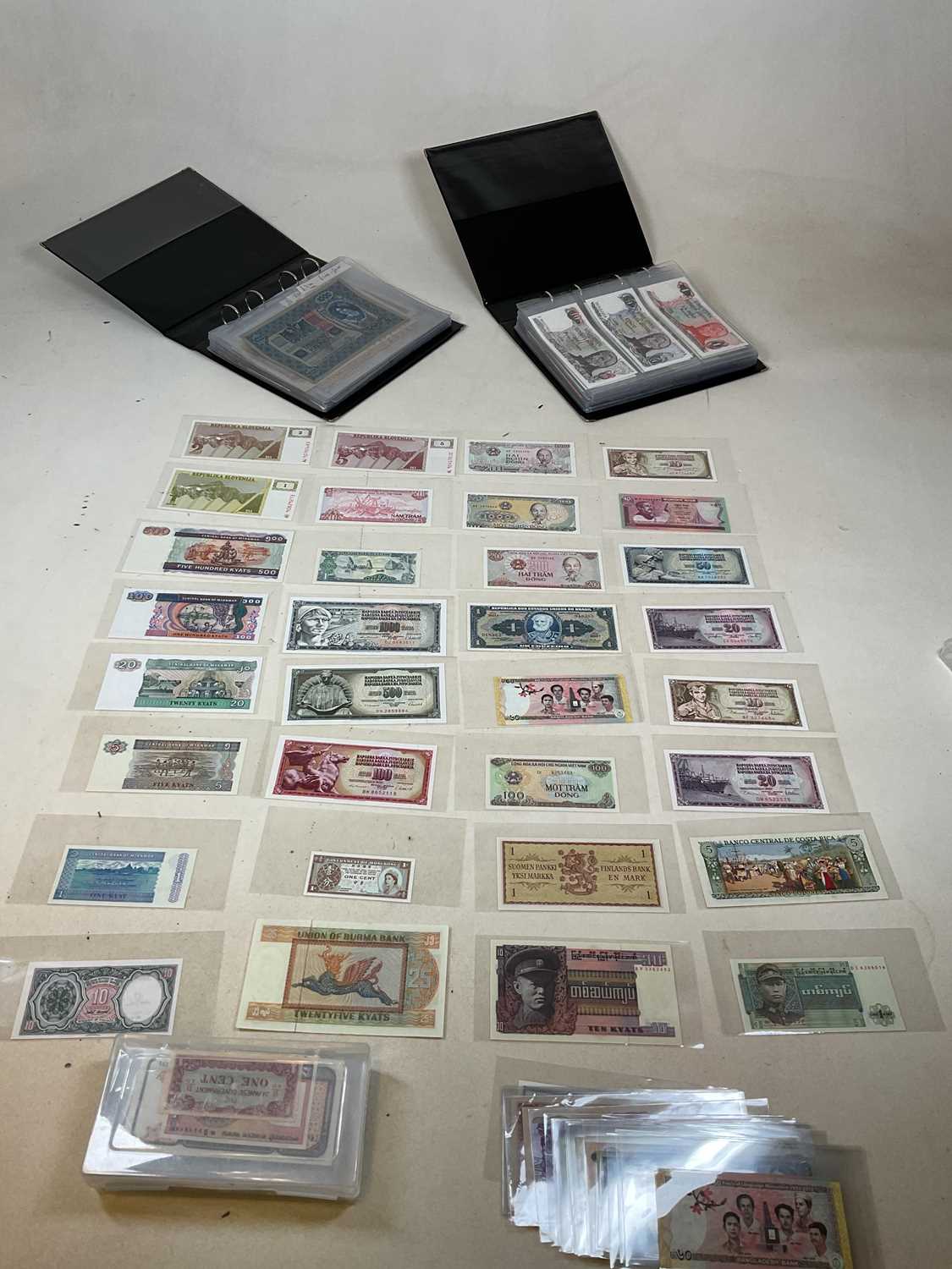 An interesting collection of world bank notes including Yugoslavia, Vietnam, Austria, Burma,