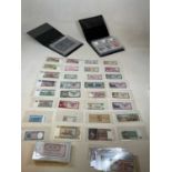 An interesting collection of world bank notes including Yugoslavia, Vietnam, Austria, Burma,