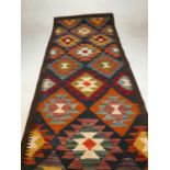 A Maimana Kilim runner, 205 x 65cm.