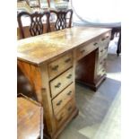 A late 19th/early 20th century burr walnut veneered crossbanded and featherbanded nine drawer