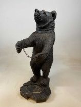 A resin Black Forest style bear stick stand, height 90cm.