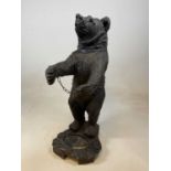 A resin Black Forest style bear stick stand, height 90cm.