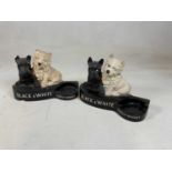 A painted plaster advertising Black & White Scotch Whisky bottle holder, width 31cm, and a near