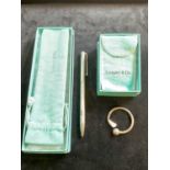 TIFFANY & CO; an unusual sterling silver fob ring modelled as a golf club and ball, and a