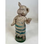 A vintage resin butcher's advertising pig, height 47cm.