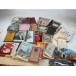 A quantity of ephemera including music sheets, postcards, collectors' cards, maps, road maps, etc.