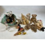 A collection of various plush teddies and toys, also doll's house furniture.