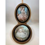 UNATTRIBUTED; a pair of oval pastels, one depicting a young lady playing with her cat, the other