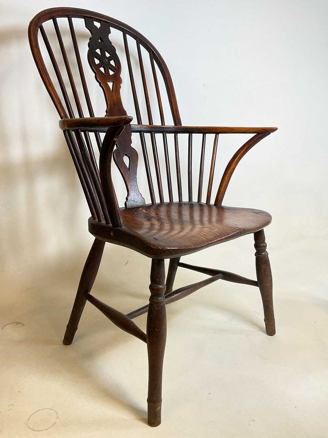 An early to mid-19th century ash and elm hoop back Windsor elbow chair with saddle seat and straight - Image 2 of 7