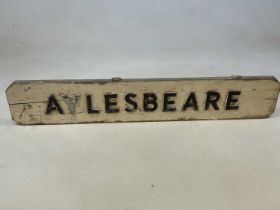A vintage white painted and applied village sign, 'Aylesbeare', width 81.5cm.