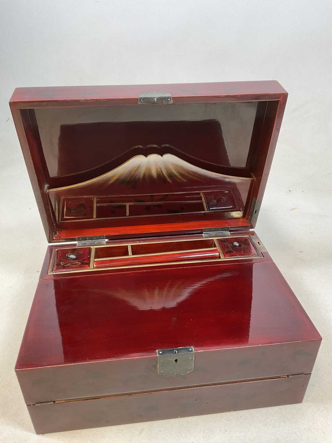 An early 20th century Japanese red lacquered and painted writing slope with hinged interior and - Image 6 of 10