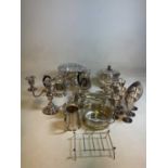 A collection of silver plate including a Viners twin handled floral decorated bowl, rose bowl,