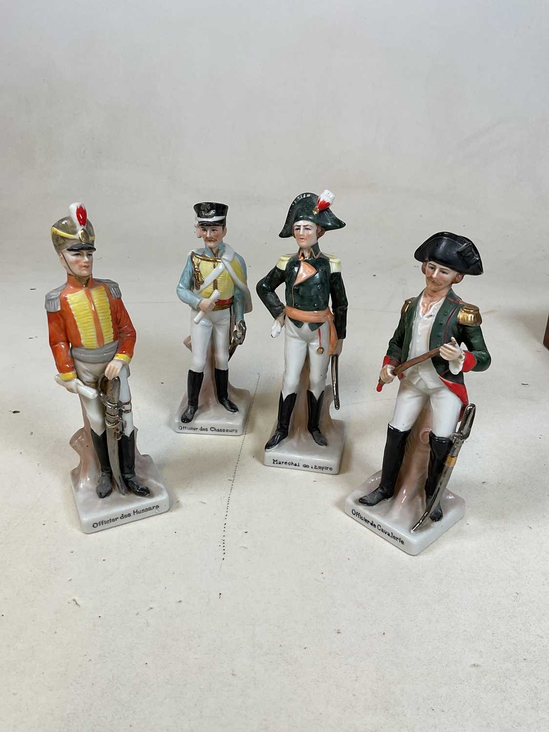 Four porcelain figures of military soldiers, a David Beckham figure, a mahogany box, and a small - Image 2 of 8