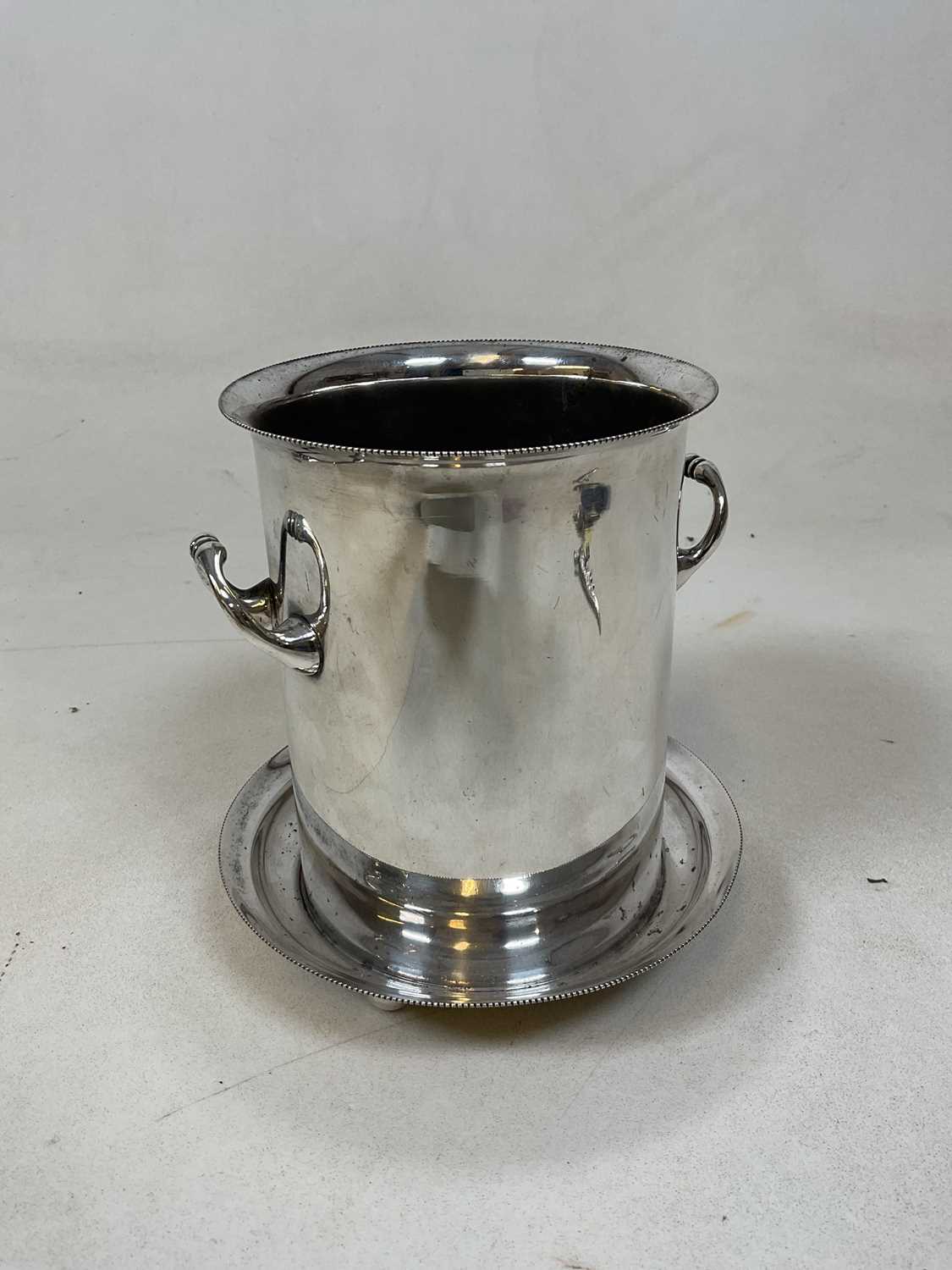 An Edwardian silver plated twin handled bottle frame and stand, height 18cm, and a pair of small - Image 3 of 3