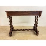 A Victorian rosewood veneered single drawer hall table with round rectangular top raised on barley