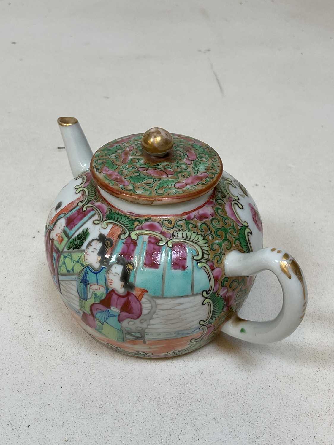 A 19th century Chinese Canton enamel Famille Rose teapot, length 15cm.