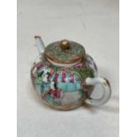 A 19th century Chinese Canton enamel Famille Rose teapot, length 15cm.