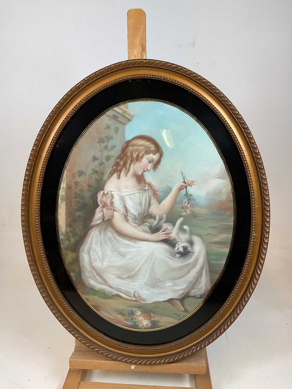UNATTRIBUTED; a pair of oval pastels, one depicting a young lady playing with her cat, the other - Image 4 of 5
