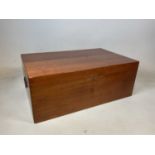 A rectangular teak blanket box, width approx 85cm.