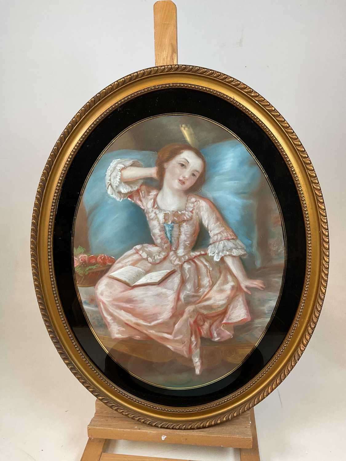 UNATTRIBUTED; a pair of oval pastels, one depicting a young lady playing with her cat, the other - Image 2 of 5