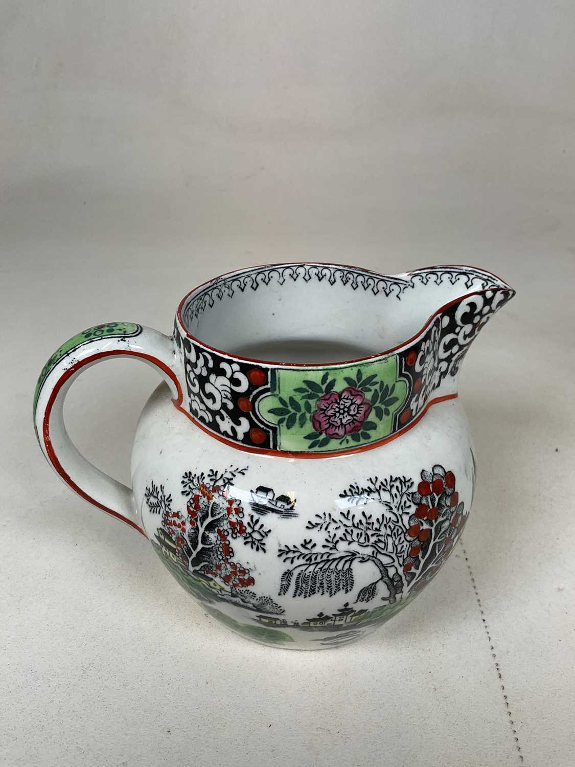 T.G. GREEN & CO LTD; four 'Ming' decorated jugs and a similarly decorated twin handled cup (5). - Image 7 of 14