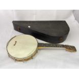 RISELONIA; a cased four string banjo with light wood veneered back and mother of pearl dot inlay