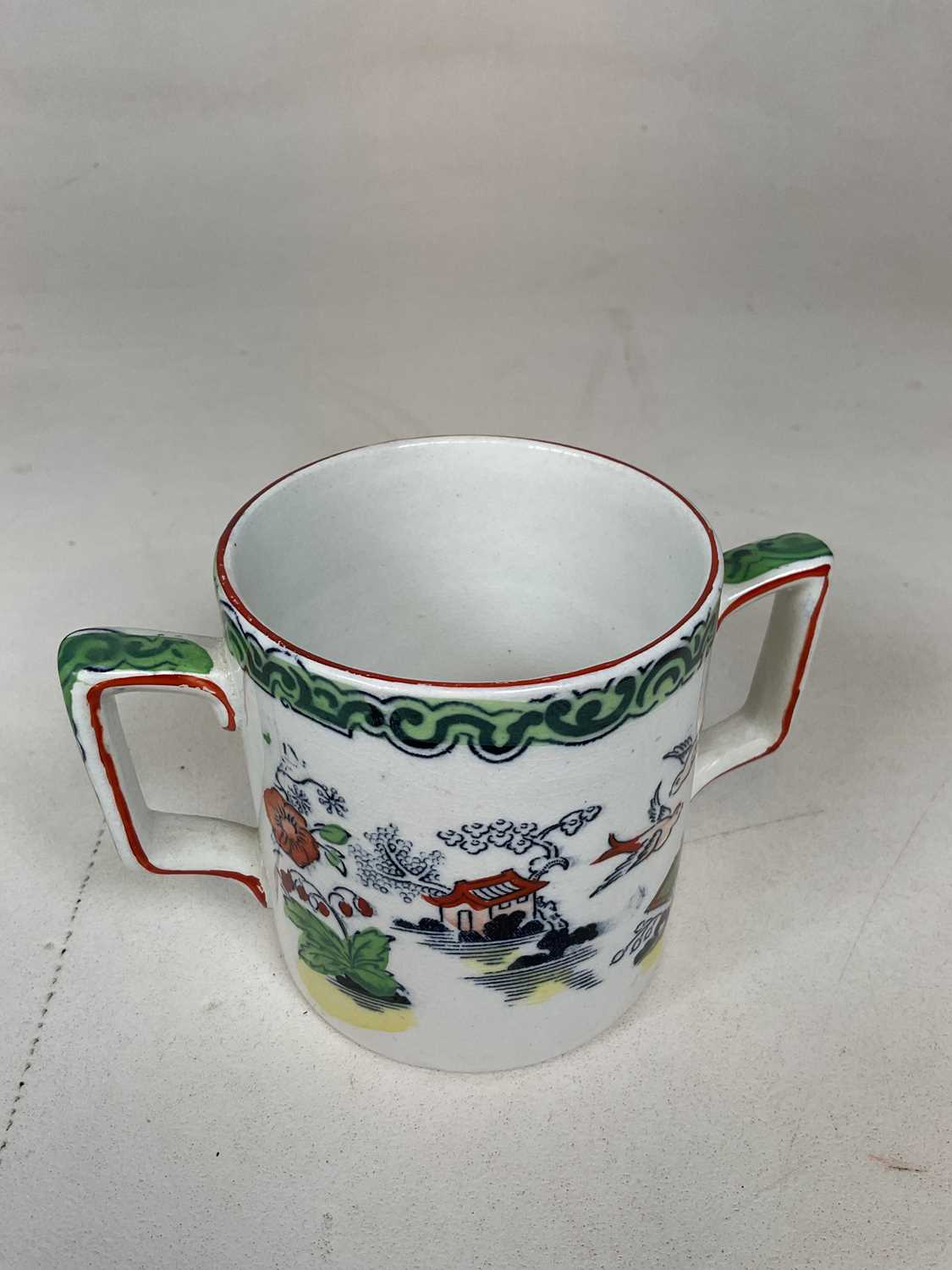 T.G. GREEN & CO LTD; four 'Ming' decorated jugs and a similarly decorated twin handled cup (5). - Image 11 of 14