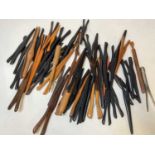 A large collection of glove stretchers.