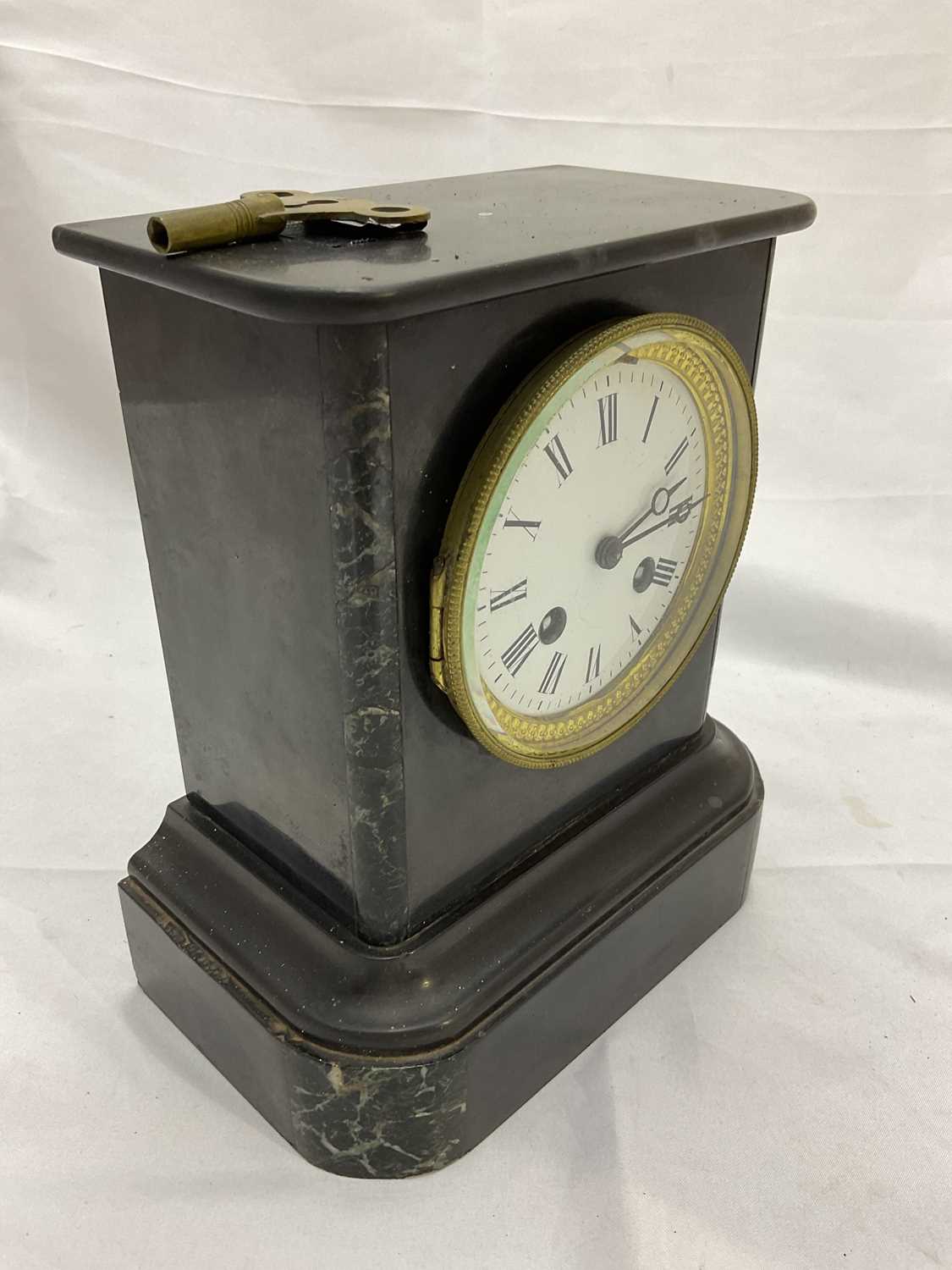 A late 19th century French black slate mantel clock with Roman numerals to the white enamel dial, - Image 2 of 11