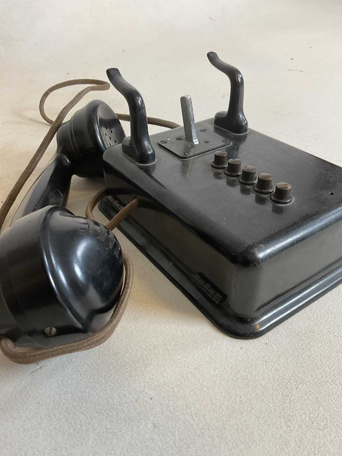 A vintage black bodied wall mounted telephone with five buttons and no dial. - Image 3 of 5