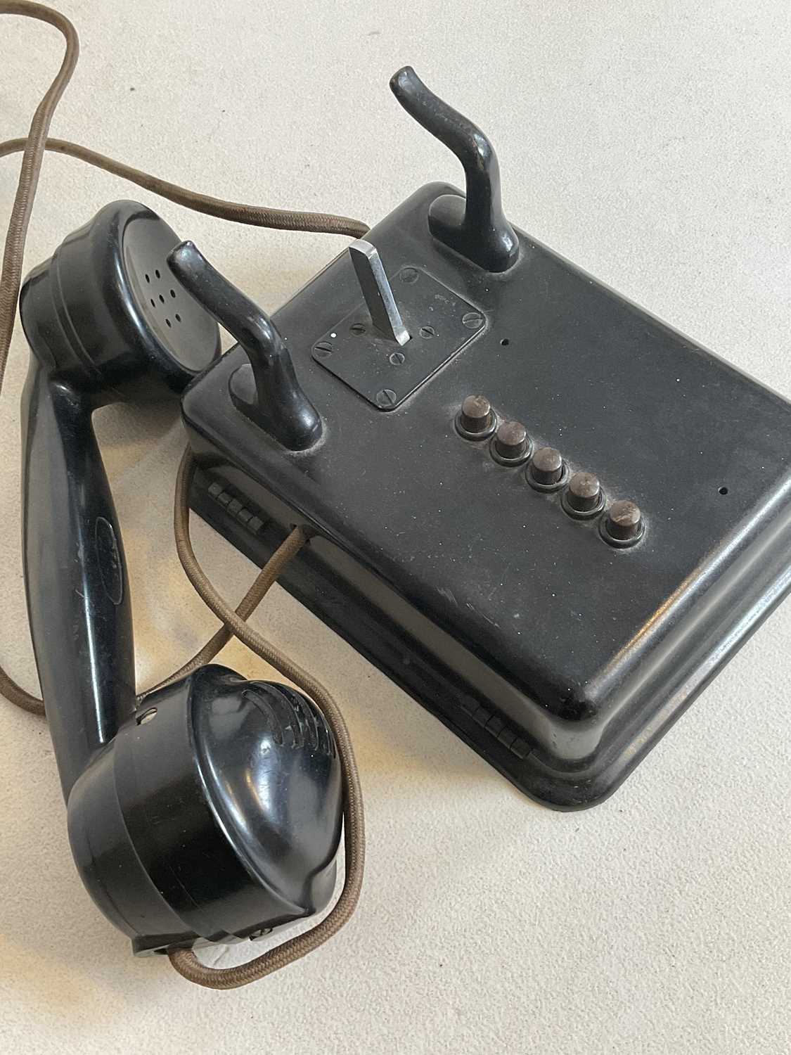 A vintage black bodied wall mounted telephone with five buttons and no dial. - Image 4 of 5