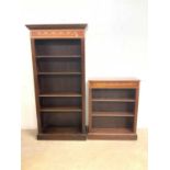 A large Edwardian style inlaid bookcase with adjustable shelves, sold with a smaller bookcase, width