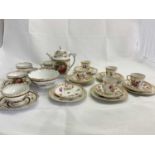DRESDEN; a part coffee service, floral decorated, and comprising six side plates, six saucers,