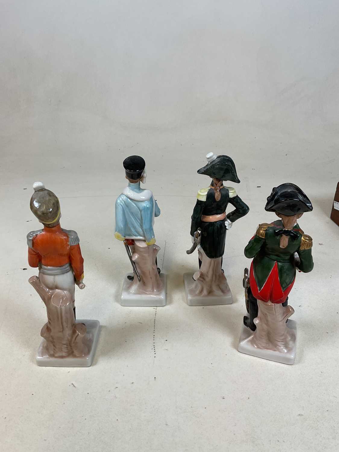 Four porcelain figures of military soldiers, a David Beckham figure, a mahogany box, and a small - Image 3 of 8